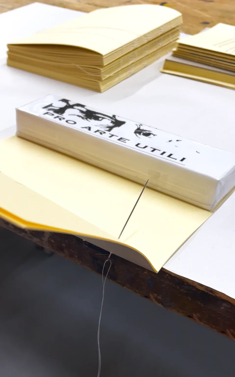 Binding the book with french link.