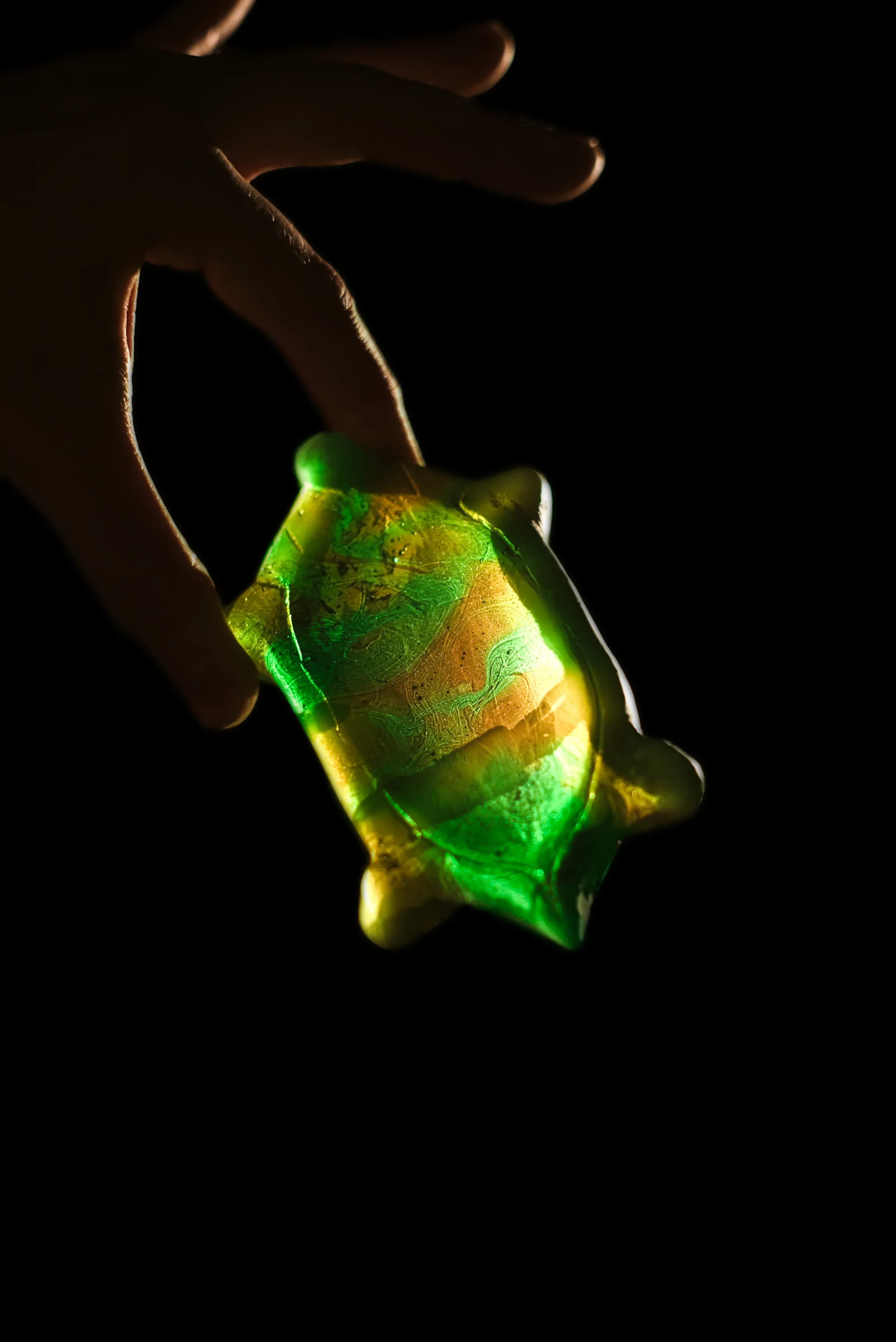 A glass sculpture resembling a sea turtle.