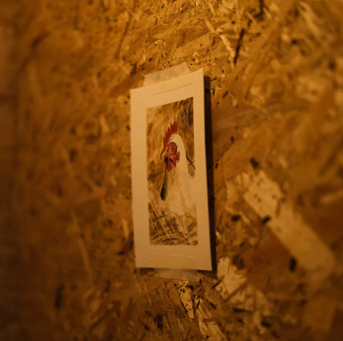 A painting of a chicken.